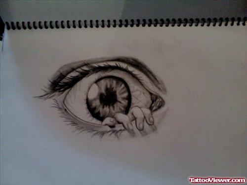Fingers Coming Out Of Eye Tattoo Design
