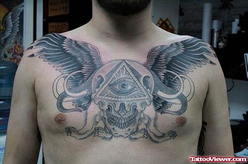 Winged Skull And Eye Of Sea Tattoo On Chest