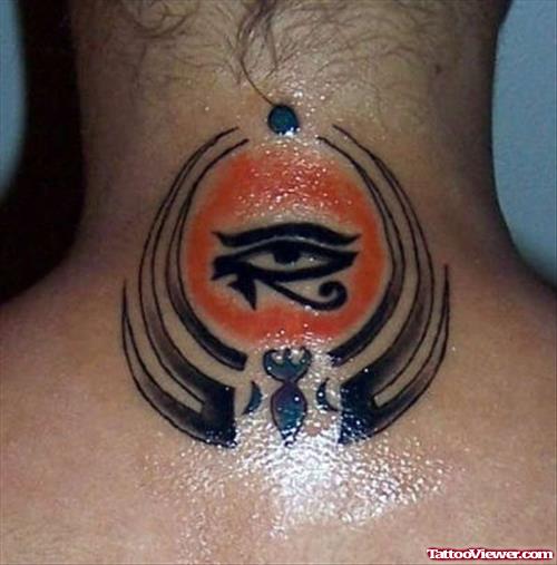 Tribal And Horus Eye Tattoo On Back
