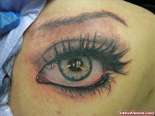 Realistic Eye Tattoo On Right Back Shoulder