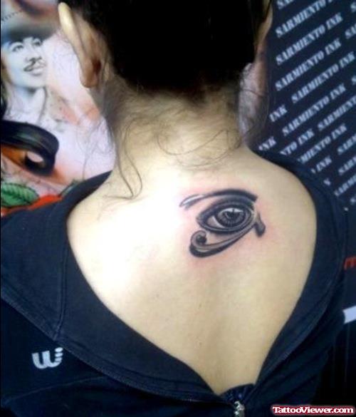 Grey Ink 3D Eye Tattoo On Girl Upperback