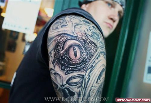 Biomechanical Eye Tattoo On Right Half Sleeve