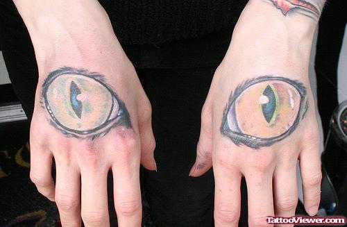 Colored Large Eye Tattoos On Both Hands