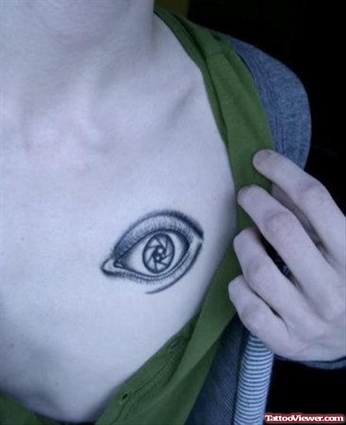 Camera Shutter Eye Tattoo On Girl Collarbone
