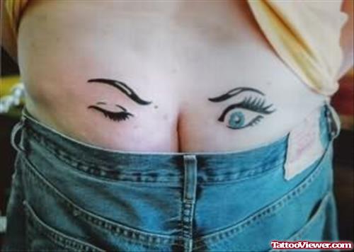 Winking Eye Tattoo On Lower Waist