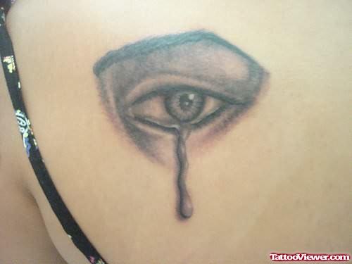 Sad Eye Tattoo On Back