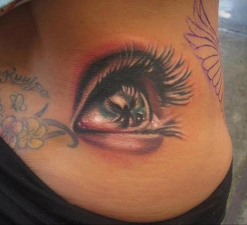 Realistic 3D Eye Tattoo On Girl Lowerback