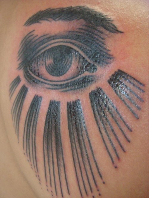 Awesome Grey Ink Glowing Eye Tattoo