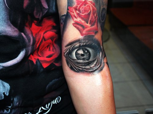 Red Rose And Eye Tattoo On Left Sleeve
