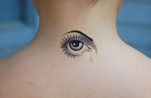 Awesome Small Grey Ink Eye Tattoo On Upperback