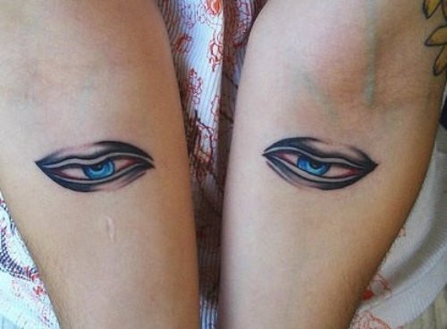 Bright Eyes Tattoos On Both Arms