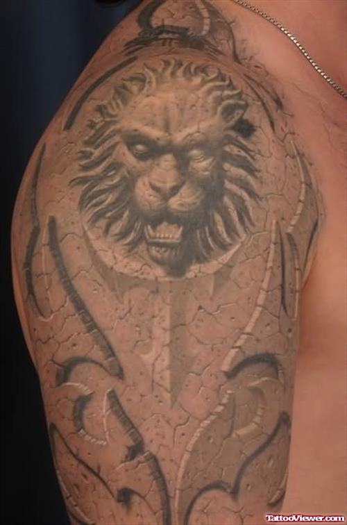 Aztec Tribal And Lion Head Face Tattoo