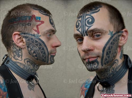 Star and Tribal Face Tattoo