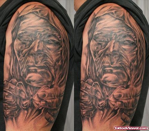 Hooded Man Destroy Butterfly Face Tattoo