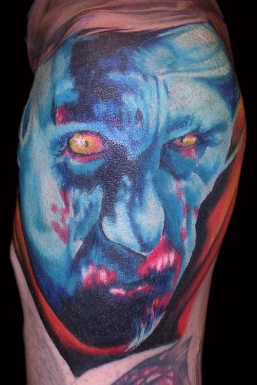 Blue Ink Creepy Face Tattoo