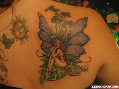 Sun Moon And Fairy Tattoo On Back