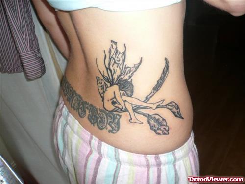 Grey Ink Sad Fairy Tattoo