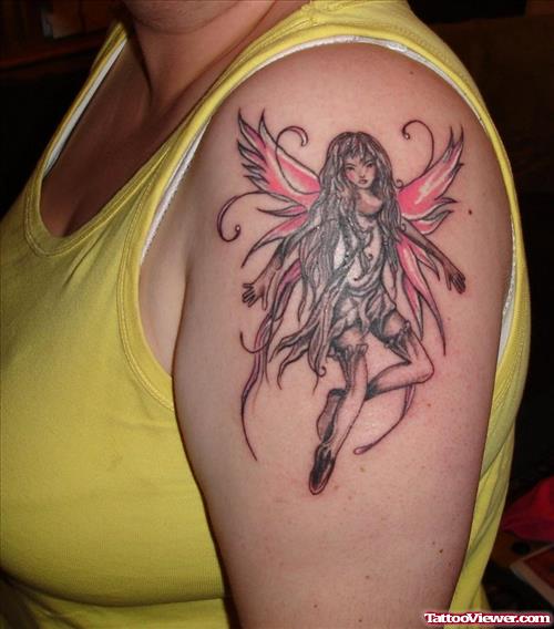 Colored Fairy Tattoo On Left Shoulder
