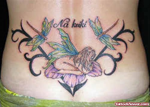 Tribal And Fairy Tattoos On Girl Lowerback