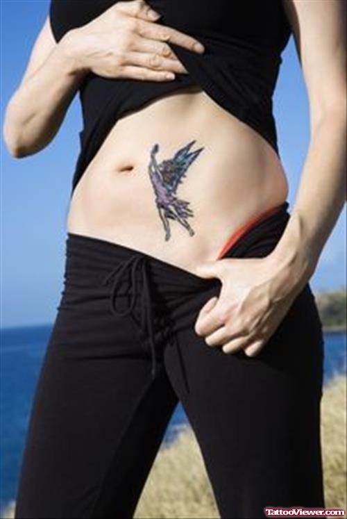 Girl Showing Her Hip Fairy Tattoo
