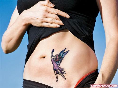 Awesome Colored Fairy Tattoo On Hip