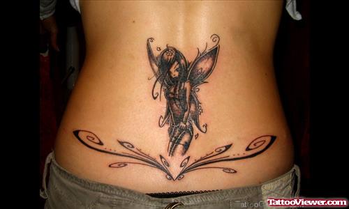Tribal And Dark Fairy Tattoo On Lowerback