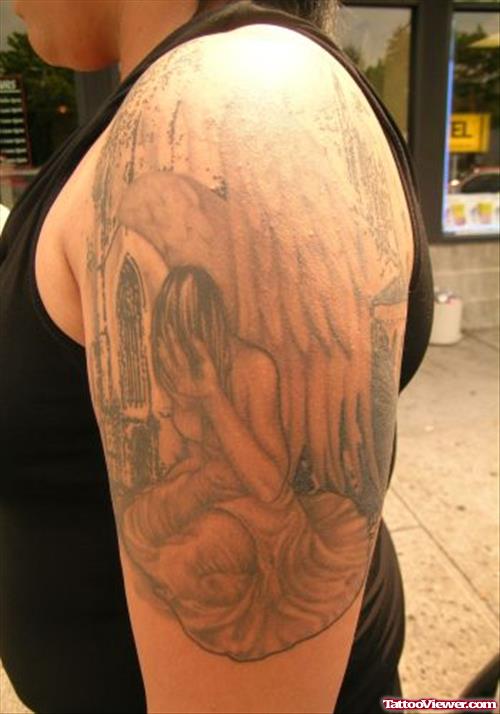 Grey Ink Sad Fairy Tattoo On Left Half Sleeve