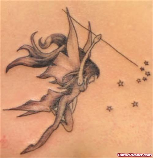 Grey Ink Flying Fairy Tattoo