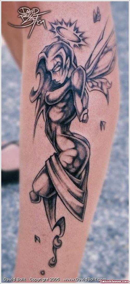 Grey Ink Fairy Tattoo On Left Leg
