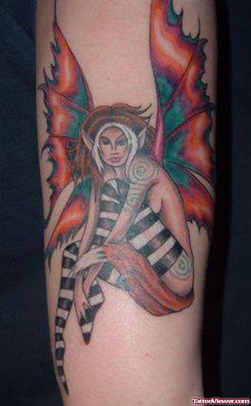 Colored Ink Gothic Fairy Tattoo On Sleeve