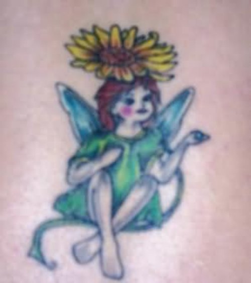 Tiny Fairy Tattoo