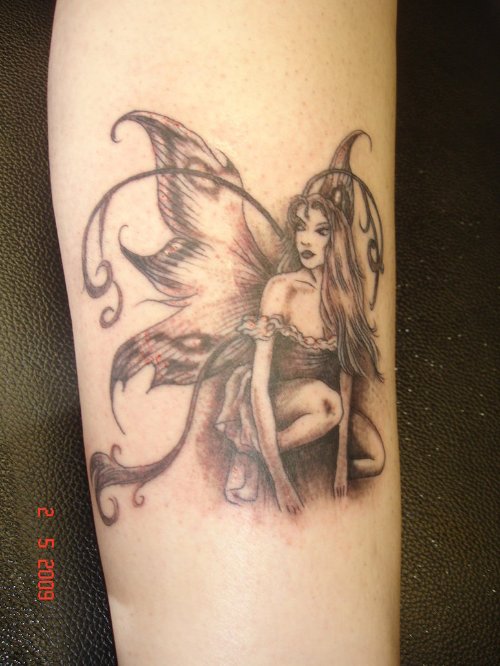 Grey Ink Fairy Tattoo On Sleeve