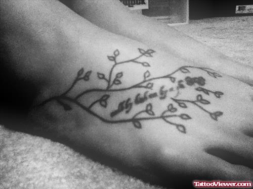 Grey Ink Right Foot Faith Tattoo