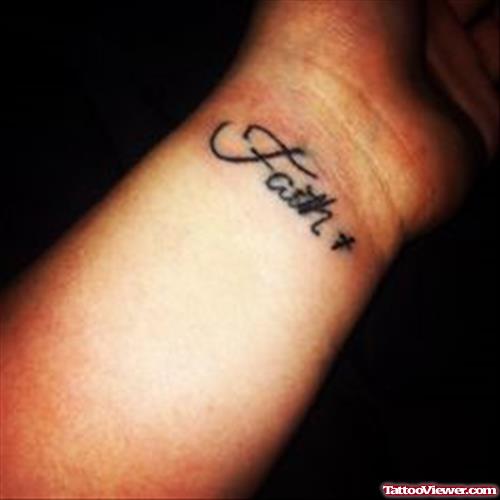 Left Wrist Tiny Cross And Faith Tattoo