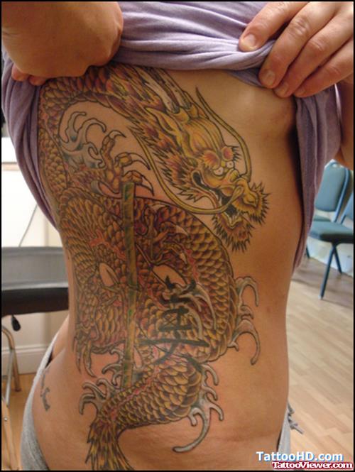 Chinese Dragon And Faith Symbol Tattoo On Side Rib