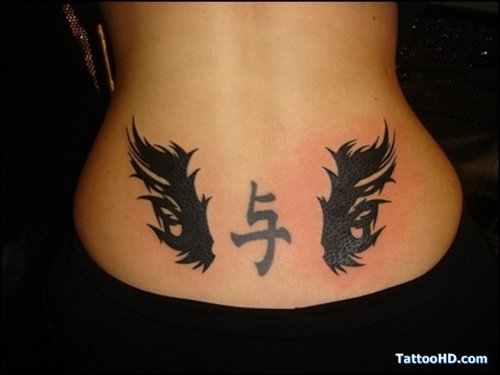 Winged Faith Symbol Tattoo On Lowerback