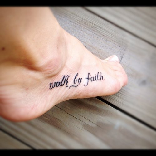 Black Ink Walk By faith text Tattoo on Foot