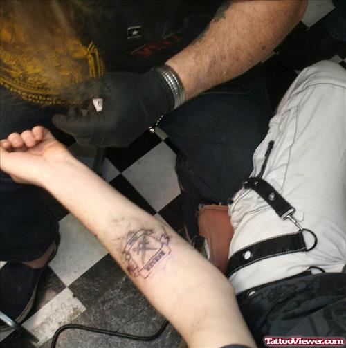 Left Arm Family Crest Tattoo