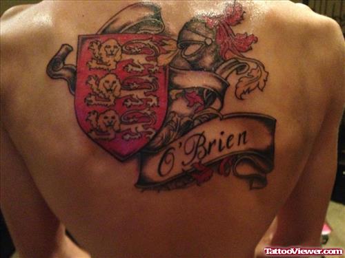 Awesome Colored Family Crest Tattoo On Upperback