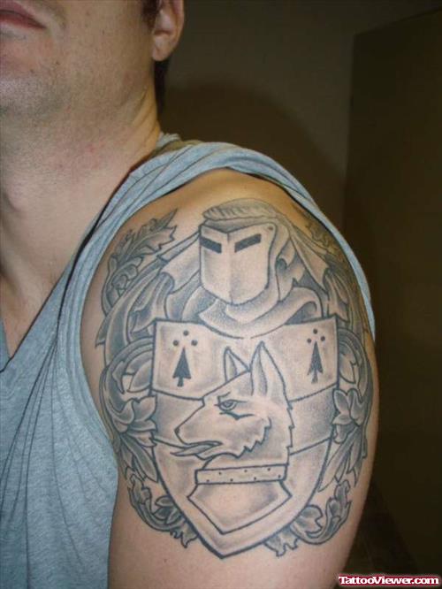 Grey Ink Family Crest Tattoo On Left Shoulder