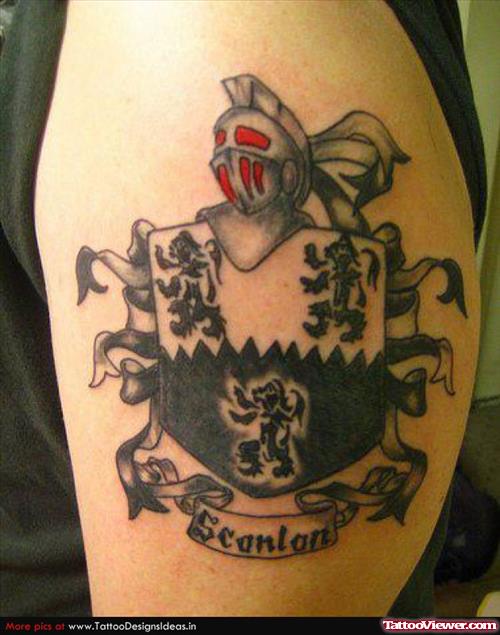 Black Ink Family Crest Tattoo On Left Half Sleeve