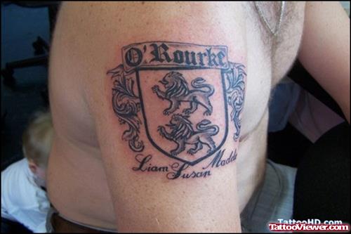 Family Crest Tattoo On Right Half Sleeve
