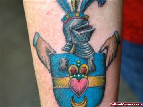 Blue Ink Family Crest Tattoo On Arm