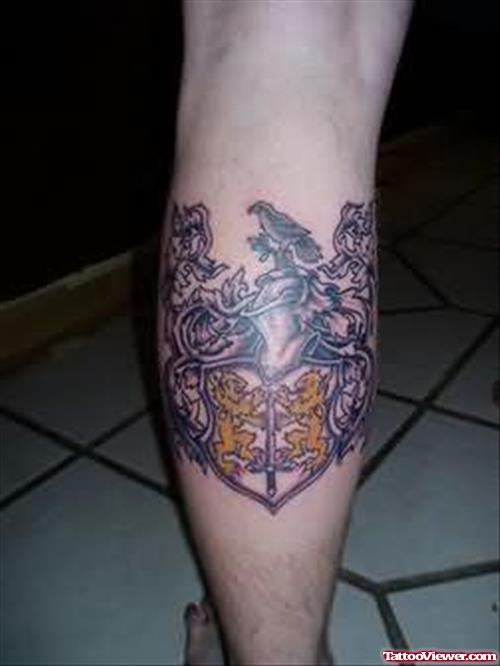 Family Crest Tattoo On Leg Back