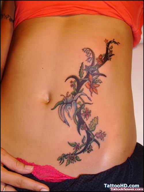 Family Flowers Tattoo On Belly
