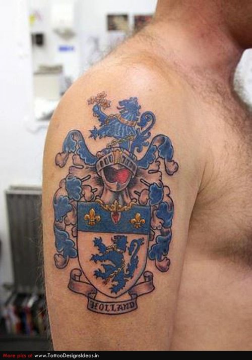 Blue Ink Family Crest Tattoo On Man Right Half Sleeve