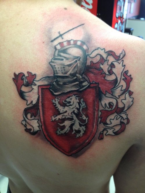Red Ink Griffin Family Crest Tattoo On Back Shoulder