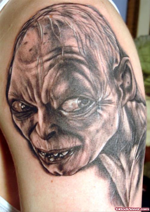 Grey Ink Fantasy Tattoos On Left Shoulder