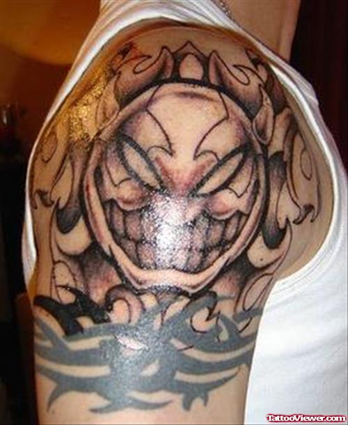 Tribal And Fantasy Tattoo On Shoulder