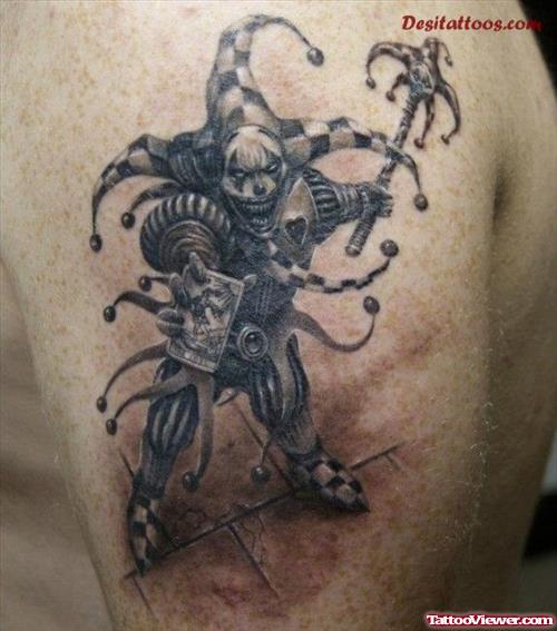 Grey Ink Joker Fantasy Tattoo On Shoulder